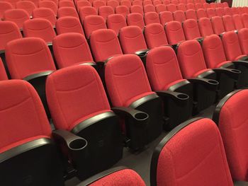 Empty red seats in auditorium