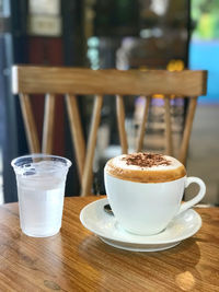 Coffee cup on table in cafe