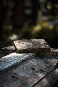 Close-up of rusty metal on rock