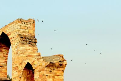 Low angle view of built structure against clear sky
