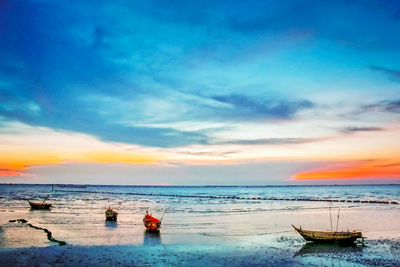 Scenic view of sea at sunset
