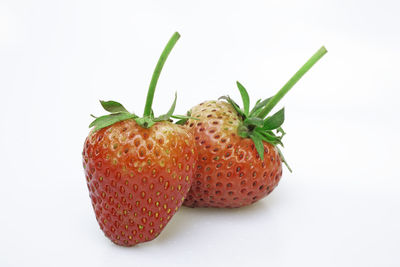 Close-up of strawberry against white background