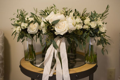 Close-up of white rose on table