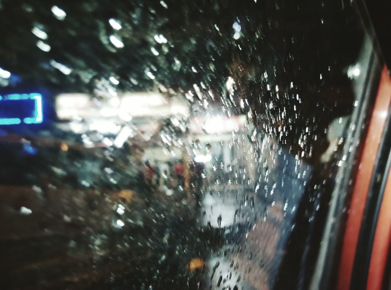 wet, rain, drop, transportation, window, car, glass - material, land vehicle, transparent, mode of transport, water, indoors, raindrop, street, weather, vehicle interior, season, focus on foreground, monsoon, windshield