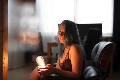 Young woman using mobile phone