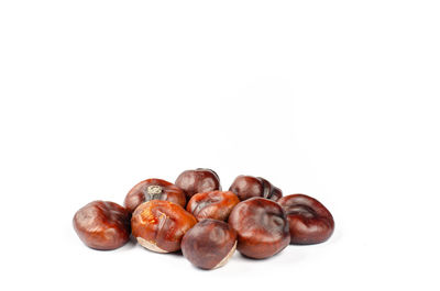 Close-up of fruits against white background