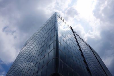 Low angle view of skyscraper against sky