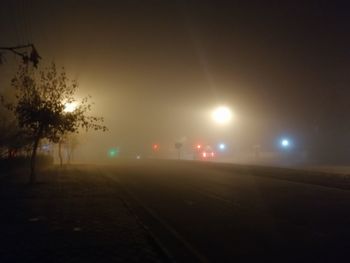 View of railroad tracks at night