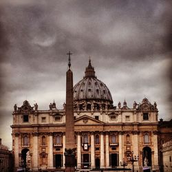 Low angle view of cathedral against cloudy sky