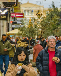 People on street in city