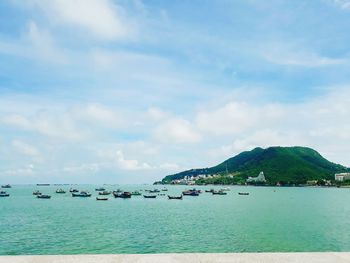 Scenic view of sea against cloudy sky