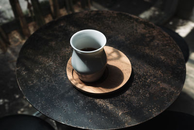 High angle view of coffee cup on table