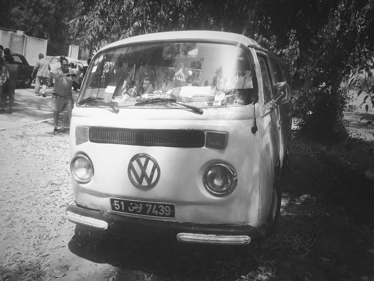 car, land vehicle, transportation, mode of transport, street, day, incidental people, outdoors, old-fashioned, retro styled, road, reflection, tree, no people, stationary, close-up, travel, headlight, old, vintage car