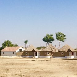 Houses against clear sky