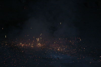 Firework display at night