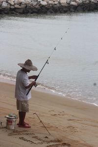 Man fishing in sea