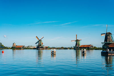 Traditional windmill against blue sky