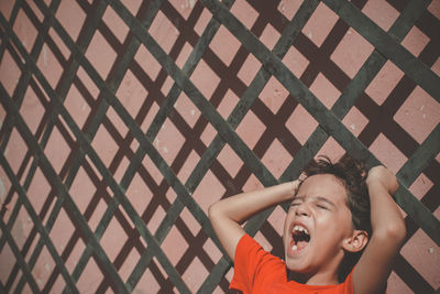 Portrait of boy shouting