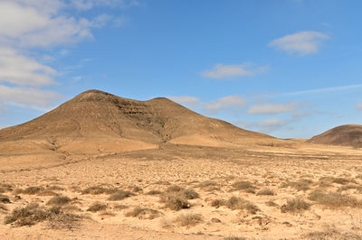 Scenic view of desert against sky