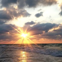 Scenic view of sea against sky at sunset