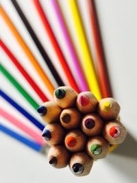 Close-up of colored pencils on table