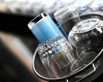 Close-up of drinking glass in container