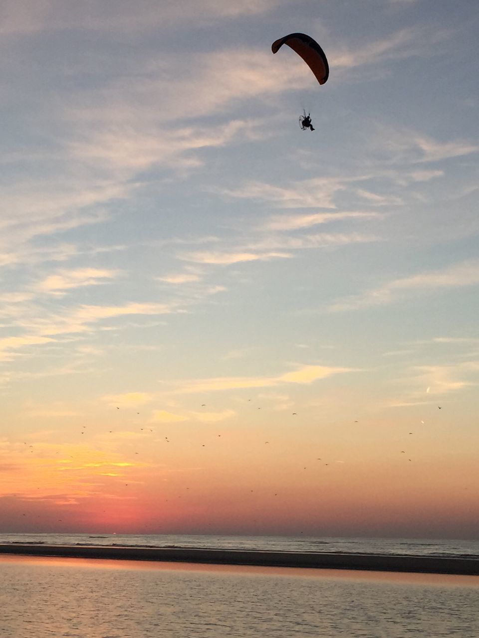 SCENIC VIEW OF SEA AT SUNSET