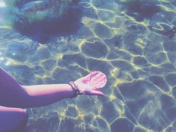 People swimming in sea