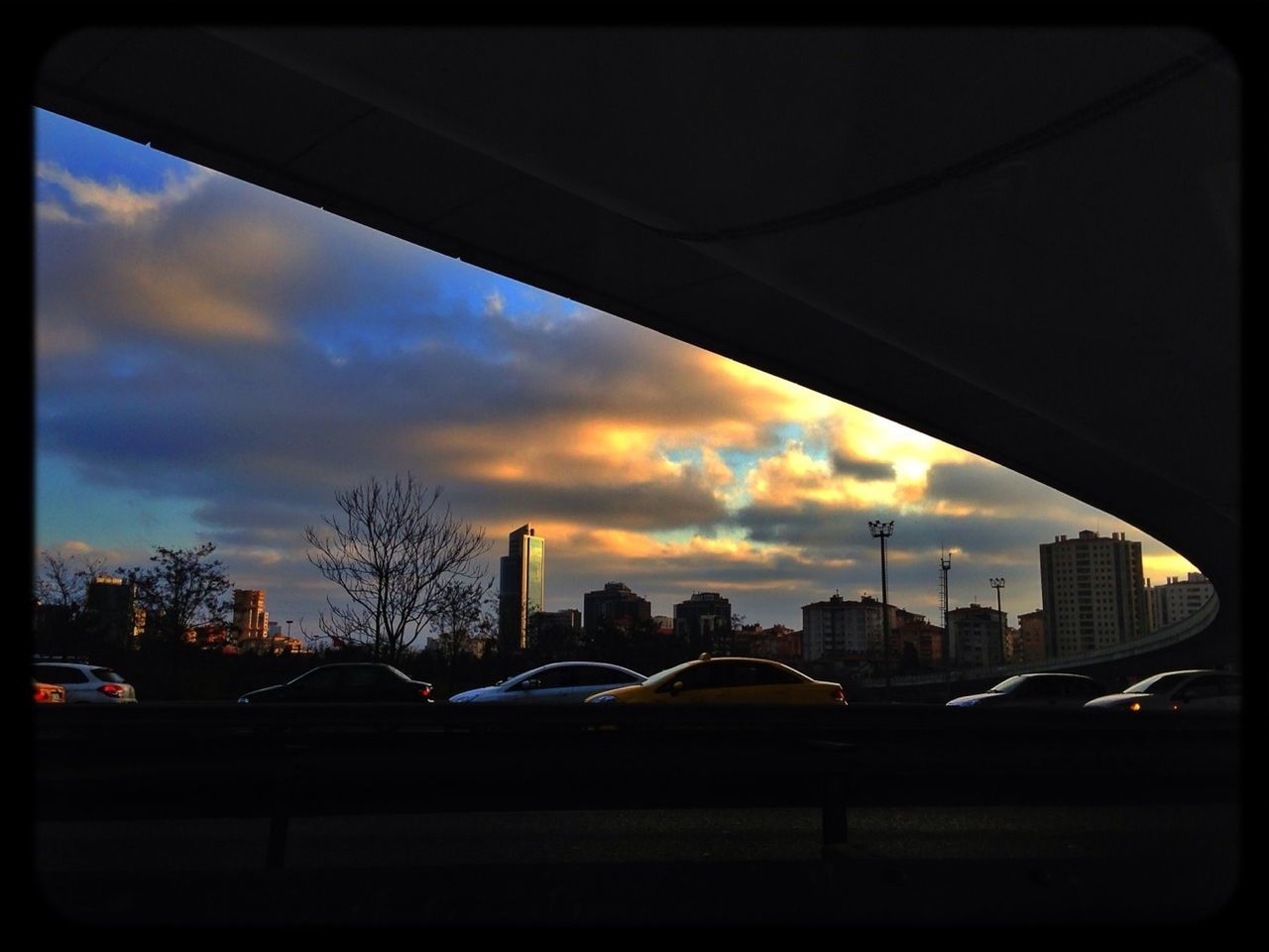 transfer print, auto post production filter, architecture, built structure, sky, building exterior, transportation, sunset, car, city, mode of transport, land vehicle, cloud - sky, silhouette, cloud, dusk, street, city life, road, travel