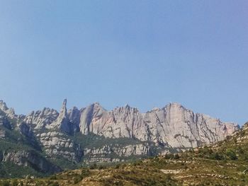 Scenic view of mountains against clear sky