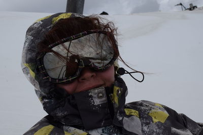 Portrait of man with snow