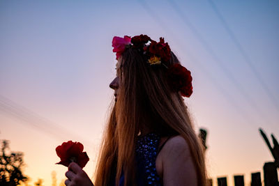 Rear view of woman with bouquet