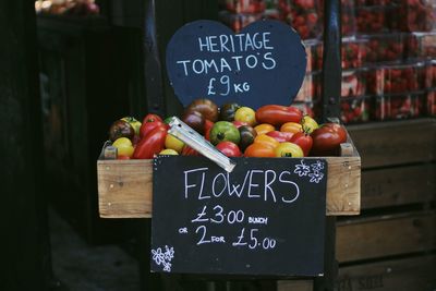 Tomatoes for sale at market stall