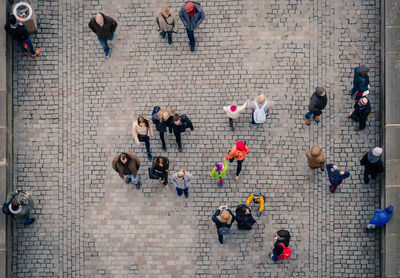 High angle view of people walking on bridge