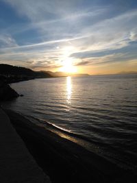 Scenic view of sea at sunset