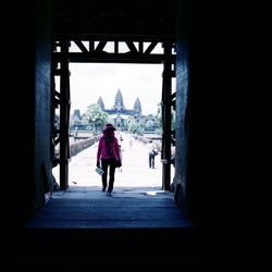 Full length of woman walking on walkway