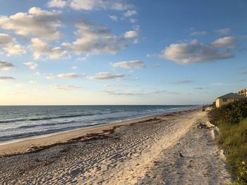 Scenic view of beach against sky