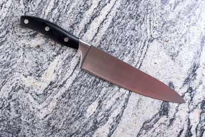 High angle view of knife on table