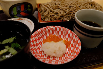 Close-up of sushi served on table