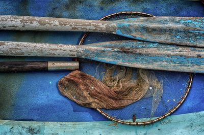 High angle view of fishing net on boat