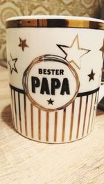 Close-up of coffee cup on table