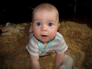 Portrait of cute baby at home