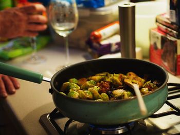 High angle view of food in sauce pan on stove at home