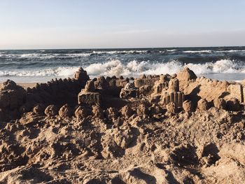 Scenic view of beach against sky