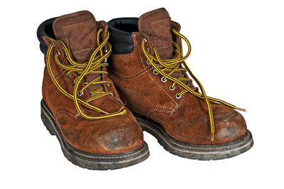 Close-up of shoes against white background