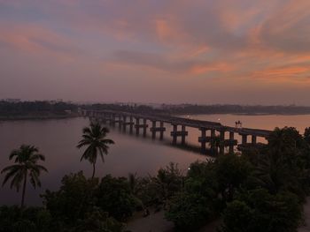 Scenic view of bridge against sky during sunset