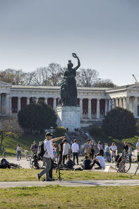 Group of people in front of building