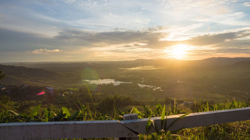 Scenic view of landscape against sky during sunset