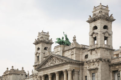 Low angle view of historical building against sky