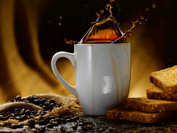 Close-up of coffee cup on table